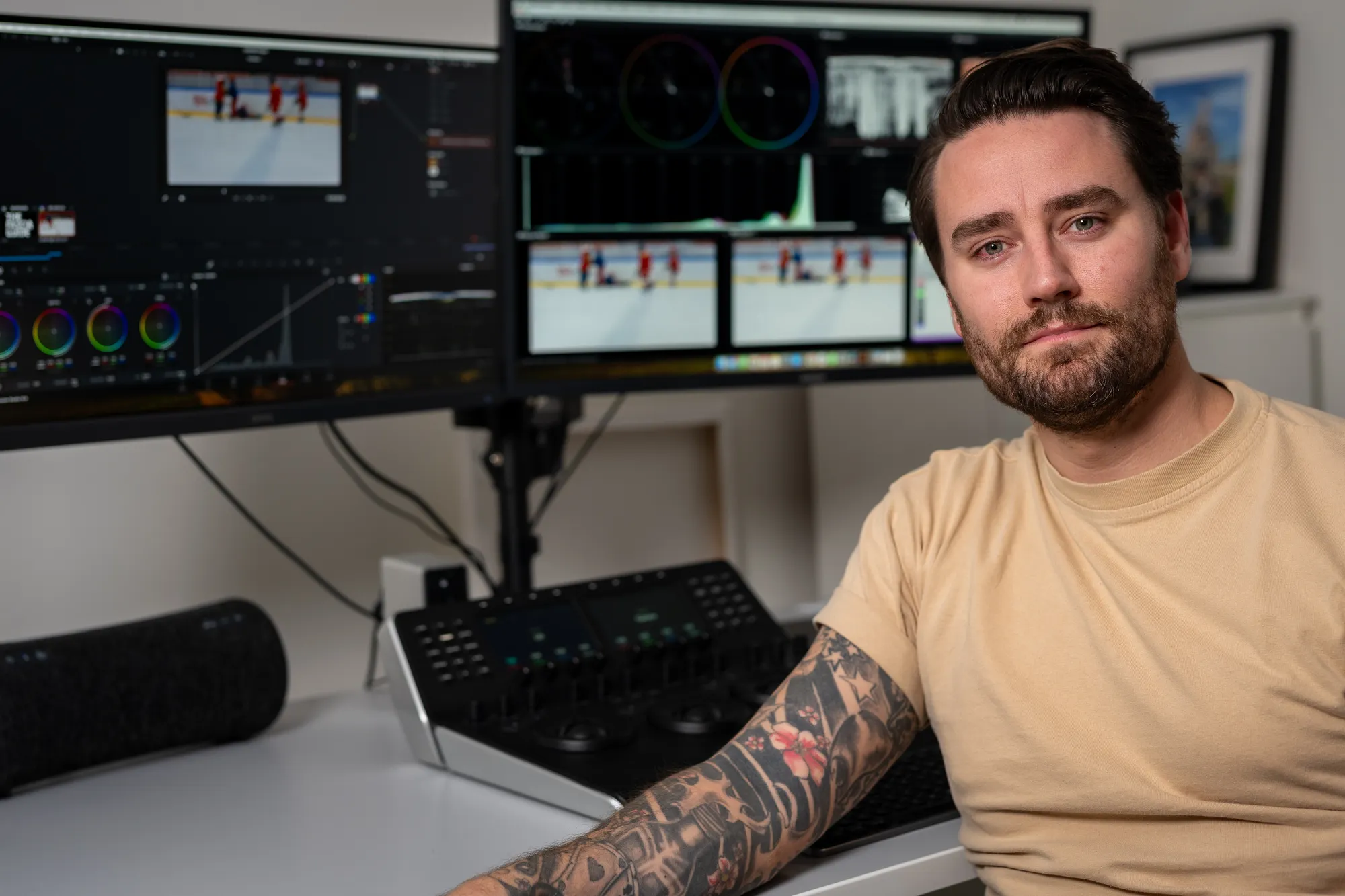 Alex at his grading desk with DaVinci Resolve on two monitors